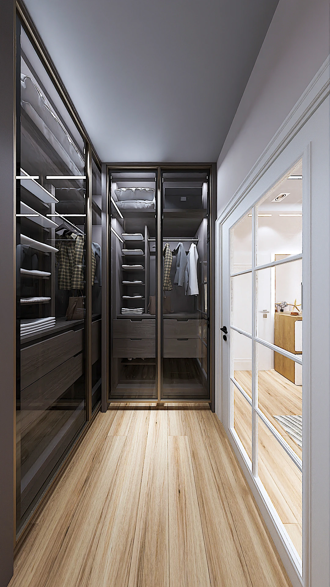 Galeria 30 Garderobë moderne e tipit walk-in closet me dyer xhami, ndriçim të brendshëm LED, rafte dhe sirtarë ngjyrë gri/dru i errët dhe dysheme druri - Interior design nga Studio Arkitekture