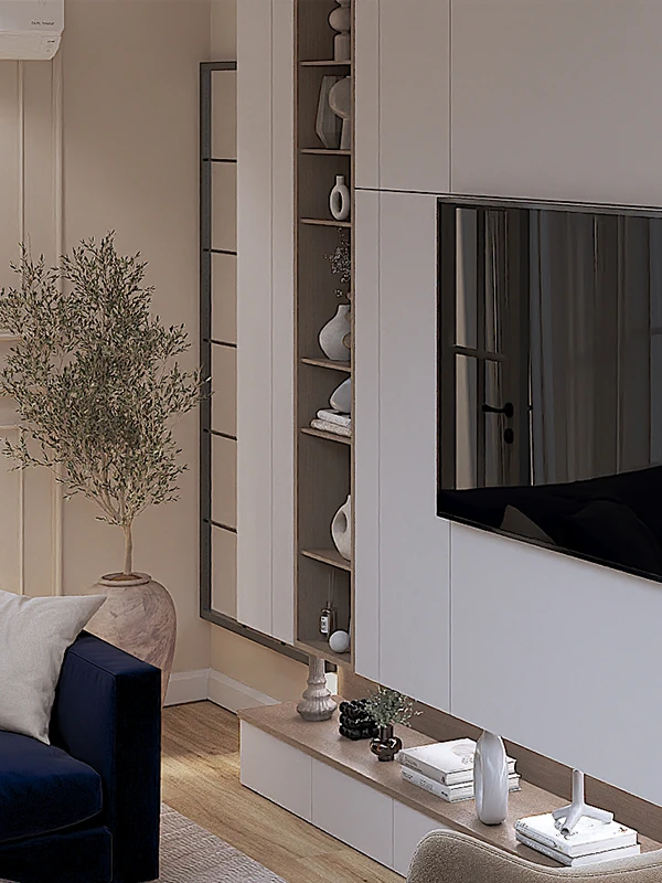Kontakto 4 Detaj i murit të TV në dhomën e ndenjes me mobilje të bardhë, rafte të larta të integruara me objekte dekorative dhe pemë ulliri në vazo të madhe terrakote - Interior design nga Studio Arkitekture